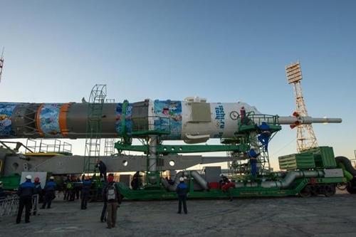 Nave que levará a tocha, nesta quinta-feira, foi especialmente decorada com o logotipo dos Jogos de Sochi 2014 / Foto:  Bill Ingalls / Nasa