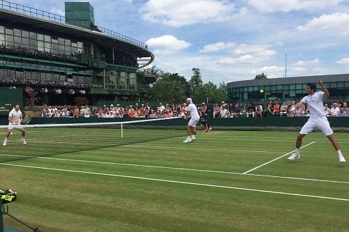 Após 3h46min de jogo, dupla superou o alemão Petzschner e o austríaco Peya para manter a invencibilidade na grama nesta temporada e avançar nas quadras do All England Club / Foto: Felipe Castanheira/Tennis Info